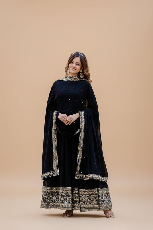 This Elegant Black Gown Features