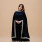 This Elegant Black Gown Features