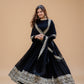 This Elegant Black Gown Features